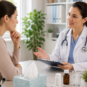 Woman and Doctor Discuss Symptoms